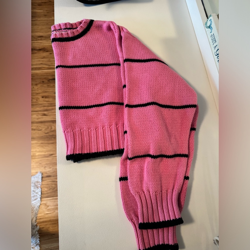 Cropped pink and black striped sweater